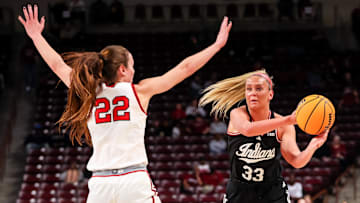 Indiana Hoosiers guard Sydney Parrish (33) looks to pass around Utah Utes forward Jenna Johnson (22) in the first half at Colonial Life Arena.