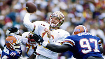 Nov 25, 1995; Gainesville, FL, USA; FILE PHOTO; Florida State Seminoles quarter back Danny Kanell (13) throwing the ball in action against the Florida Gators at Ben Hill Griffin Stadium. Mandatory Credit: Imagn Images 