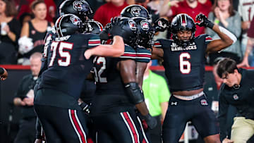 Nov 2, 2024; Columbia, South Carolina, USA; South Carolina Gamecocks tight end Joshua Simon (6) celebrates a touchdown reception against the Texas A&M Aggies in the first quarter at Williams-Brice Stadium. Mandatory Credit: Jeff Blake-Imagn Images