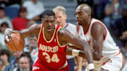 Unknown Date; Miami, FL, USA; FILE PHOTO; Houston Rockets center #34 HAKEEM OLAJUWON in action against JOHN SALLEY of the Miami Heat at the Miami Arena during the 1994-95 season. Mandatory Credit: Photo By Imagn Images (c) Copyright Imagn Images
