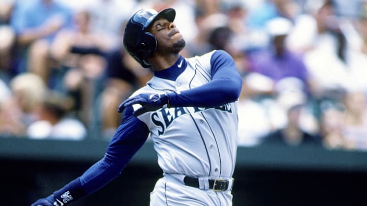 Jun 16, 1996; Baltimore, MD, USA; FILE PHOTO; Seattle Mariners outfielder Ken Griffey Jr. hits a home run against the Baltimore Orioles at Camden Yards. Mandatory Credit: RVR Photos-Imagn Images