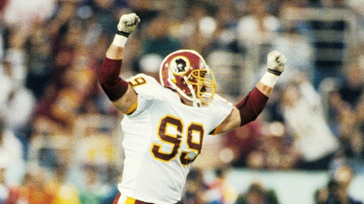 Washington Redskins defensive end Jason Buck celebrates after a play against the Buffalo Bills during Super Bowl XXVI 