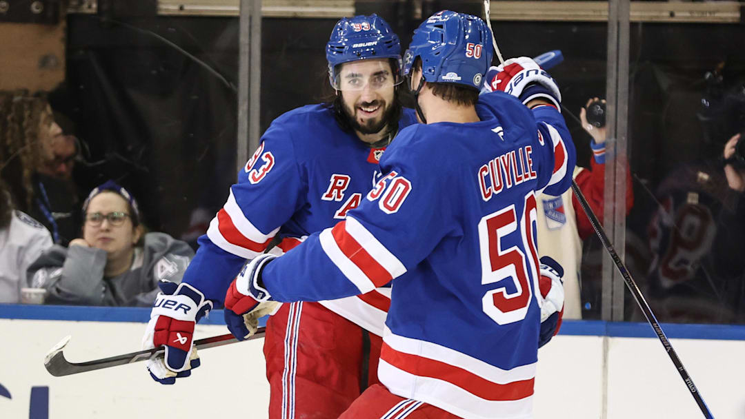 Apr 17, 2025; New York, New York, USA;  New York Rangers center Mika Zibanejad (93) celebrates with left wing Will Cuylle (50) after scoring a goal in the third period against the Tampa Bay Lightning at Madison Square Garden. Mandatory Credit: Wendell Cruz-Imagn Images