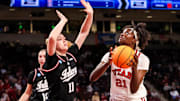 Mar 21, 2025; Columbia, South Carolina, USA; Utah Utes forward Maye Toure (21) looks to shoot over Indiana Hoosiers forward Karoline Striplin (11) in the second half at Colonial Life Arena.