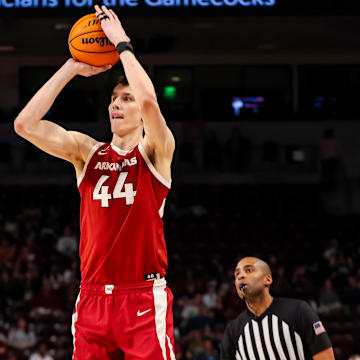Mar 1, 2025; Columbia, South Carolina, USA; Arkansas Razorbacks forward Zvonimir Ivisic (44) attempts a three point basket against the South Carolina Gamecocks in the second half at Colonial Life Arena. Mandatory Credit: Jeff Blake-Imagn Images