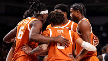 Feb 22, 2025; Columbia, South Carolina, USA; Texas Longhorns players huddle against the South Carolina Gamecocks in the first half at Colonial Life Arena. Mandatory Credit: Jeff Blake-Imagn Images