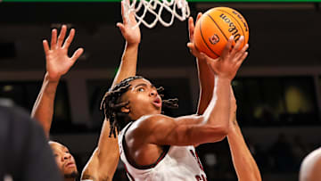 Dec 22, 2024; Columbia, South Carolina, USA; South Carolina Gamecocks forward Collin Murray-Boyles (30) drives past Radford Highlanders forward Isaiah Gaines (6) in the first half at Colonial Life Arena. Mandatory Credit: Jeff Blake-Imagn Images