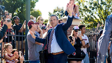 Oct 18, 2025; Columbia, South Carolina, USA;  South Carolina Gamecocks head coach Shane Beamer takes part in the Gamecock Walk before the game against the Oklahoma Sooners at Williams-Brice Stadium. Mandatory Credit: Jeff Blake-Imagn Images