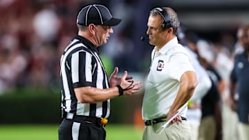 Sep 21, 2024; Columbia, South Carolina, USA; South Carolina Gamecocks head coach Shane Beamer disputes a call against the Akron Zips in the second half at Williams-Brice Stadium. Mandatory Credit: Jeff Blake-Imagn Images