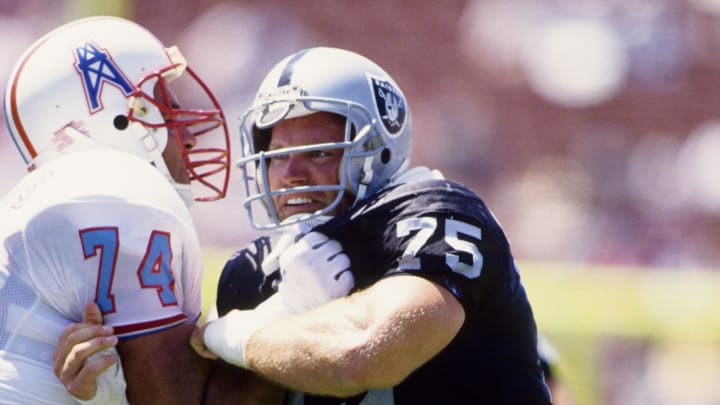 Aug 29, 1992; Los Angeles, CA, USA; FILE PHOTO; Los Angeles Raiders defensive tackle Howie Long (75) in action against the Houston Oliers during a pre-season game at the Los Angeles Coliseum. Mandatory Credit: USA TODAY Sports