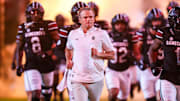 Sep 27, 2025; Columbia, South Carolina, USA; South Carolina Gamecocks head coach Shane Beamer leads his team onto the field during the Gamecocks 2001 entrance before their game against the Kentucky Wildcats at Williams-Brice Stadium. Mandatory Credit: Jeff Blake-Imagn Images