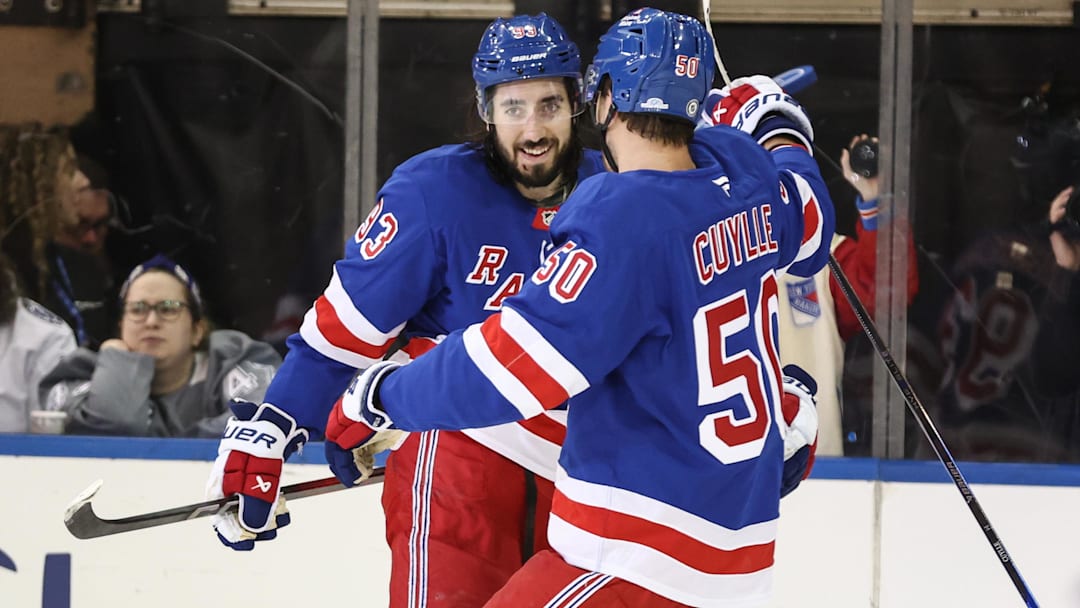 Apr 17, 2025; New York, New York, USA;  New York Rangers center Mika Zibanejad (93) celebrates with left wing Will Cuylle (50) after scoring a goal in the third period against the Tampa Bay Lightning at Madison Square Garden. Mandatory Credit: Wendell Cruz-Imagn Images
