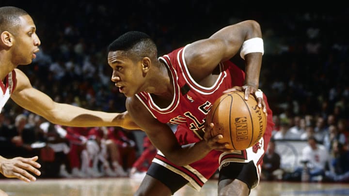 Unknown date 1992; Philadelphia, PA, USA; FILE PHOTO; Chicago Bulls guard B.J. Armstrong (10) in action against the Philadelphia 76ers at the Spectrum. Mandatory Credit: Imagn Images