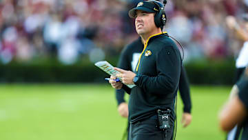 Nov 16, 2024; Columbia, South Carolina, USA; Missouri Tigers head coach Eliah Drinkwitz directs his team against the South Carolina Gamecocks in the first quarter at Williams-Brice Stadium. Mandatory Credit: Jeff Blake-Imagn Images