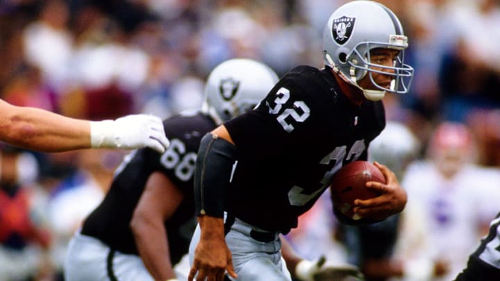 Dec 8, 1991; Los Angeles, CA, USA; FILE PHOTO; Los Angeles Raiders running back Marcus Allen (32) in action against the Buffalo Bills at the Los Angeles  Coliseum. Mandatory Credit: USA TODAY Sports