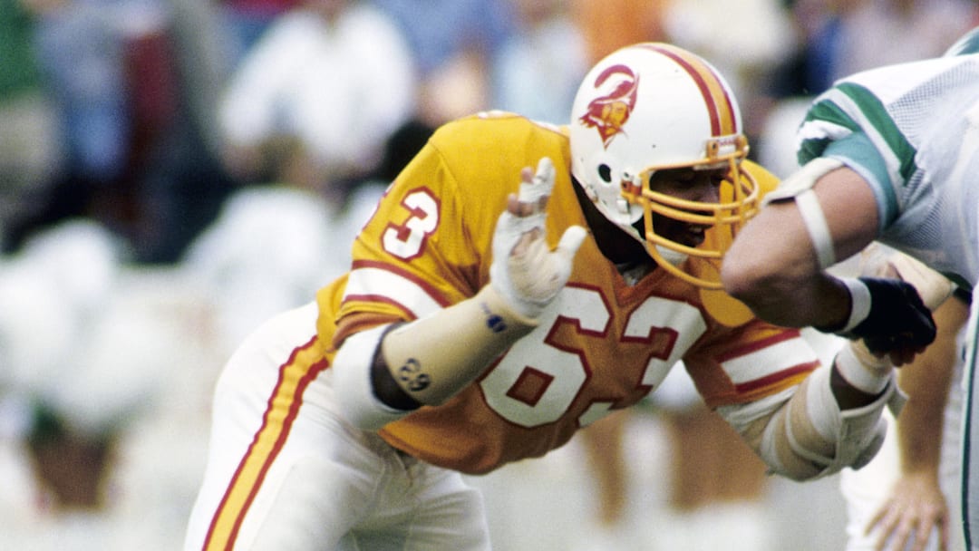 USF's Josh Celiscar says he feels a responsibility to live up to Lee Roy Selmon's legacy on and off the field, now that he was chosen to wear Selmon's iconic No. 63 this season.