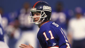 Sep 13, 1992; East Rutherford, NJ, USA; FILE PHOTO; New York Giants quarterback (11) Phil Simms in action against the Dallas Cowboys at Giants Stadium.  