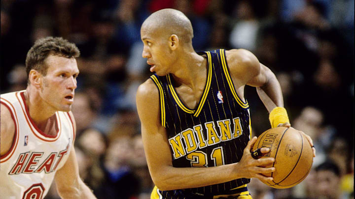 Unknown date, 1998; Miami, FL; USA; FILE PHOTO; Indiana Pacers guard Reggie Miller (31) in action against Miami Heat guard Dan Majerle (9) at the Miami Arena. Mandatory Credit: RVR Photos-USA TODAY Sports