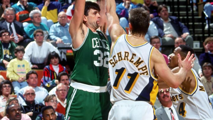 Unknown date; Indianapolis, IN, USA; FILE PHOTO; Boston Celtics forward (32) Kevin McHale is defended by Indiana Pacers forward (11) Detlef Schrempf at Market Square Arena. Mandatory Credit: Photo by USA TODAY Sports