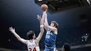 Mar 23, 1974; Greensboro, NC, USA; FILE PHOTO; UCLA Bruins center (32) Bill Walton in action against the North Carolina State Wolfpack during the 1974 Final Four.  Mandatory Credit: Malcolm Emmons-Imagn Images