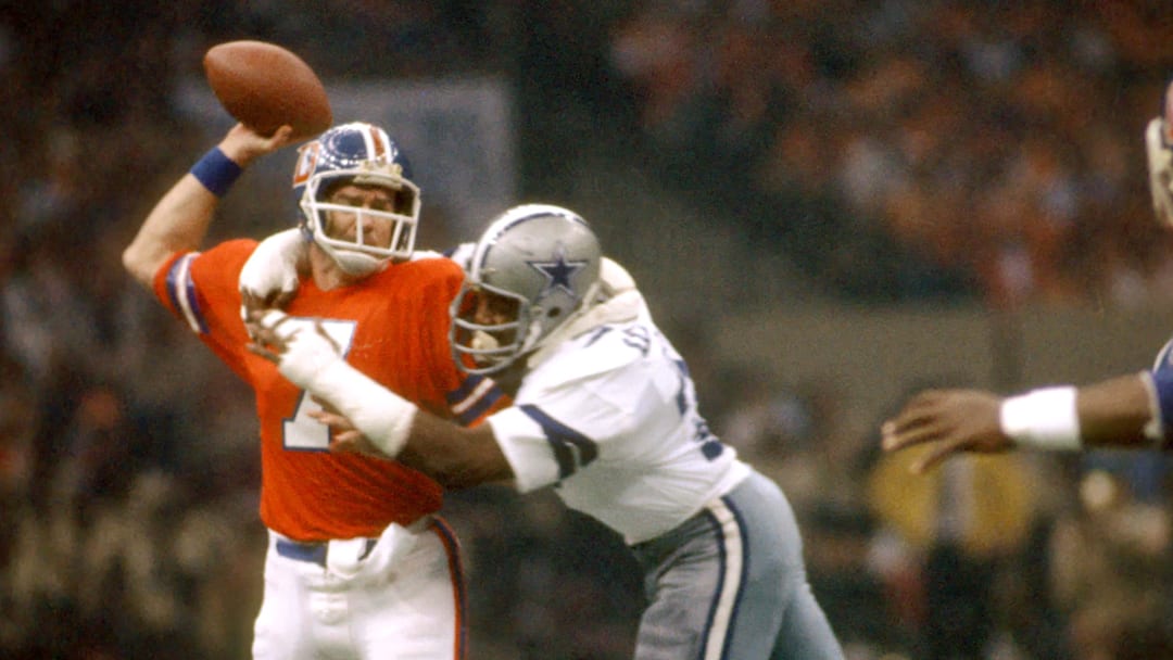 Jan 15,1978; New Orleans, LA, USA; FILE PHOTO; Dallas Cowboys defensive end #79 Harvey Martin pressures Denver Broncos quarterback #7 Craig Morton during Super Bowl XII at the Superdome. Martin was named co most valuable player with teammate Randy White (not pictured). The Cowboys defeated the Bronocs 27-10. Mandatory Credit: Photo By Malcolm Emmons-Imagn Images © Copyright 1978 Malcolm Emmons Jan 15,1978; New Orleans, LA, USA; FILE PHOTO; Dallas Cowboys defensive end #79 Harvey Martin pressures Denver Broncos quarterback #7 Craig Morton during Super Bowl XII at the Superdome. Martin was named co most valuable player with teammate Randy White (not pictured). The Cowboys defeated the Bronocs 27-10. Mandatory Credit: Photo By Malcolm Emmons-Imagn Images © Copyright 1978 Malcolm Emmons
