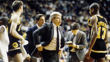 Unknown date & location, USA; FILE PHOTO; Iowa Hawkeyes head coach Tom Davis and point guard B.J. Armstrong (10) on the sideline 1986-1989. Mandatory Credit: Malcolm Emmons-Imagn Images
