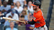 Jul 19, 2025; Tampa, Florida, USA; Baltimore Orioles first baseman Ryan O'Hearn (32) hits an rbi single against the Tampa Bay Rays in the first inning at George M. Steinbrenner Field.
