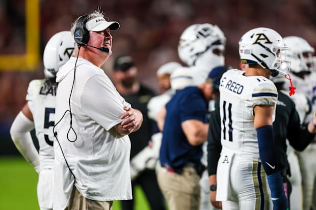 Akron Zips head coach Joe Moorhead directs his team against the South Carolina Gamecocks.