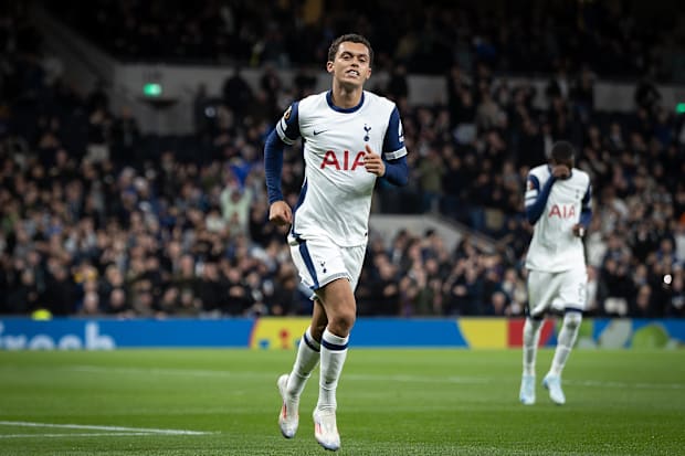 Brennan Johnson wheeling away in celebration.