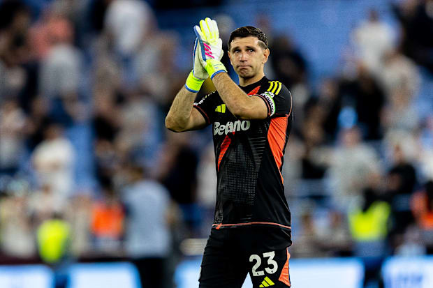 Emiliano Martínez tearfully applauding Aston Villa fans.