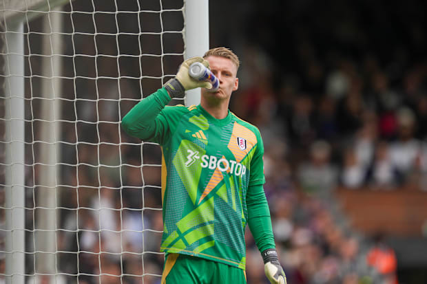 Bernd Leno sucking on a bottle of water.