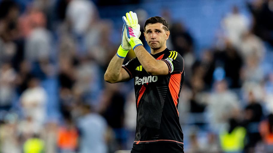 Emiliano Martínez tearfully applauding Aston Villa fans.