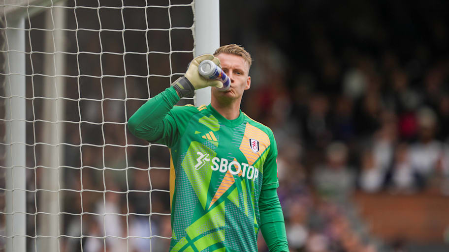 Bernd Leno sucking on a bottle of water.