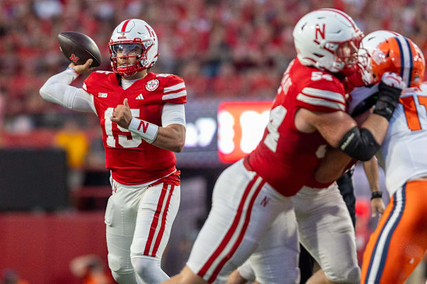 Nebraska quarterback Dylan Raiola throws a short pass against Illinois.