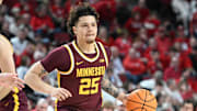 Mar 1, 2025; Lincoln, Nebraska, USA;  Minnesota Golden Gophers guard Lu'Cye Patterson (25) dribbles against the Nebraska Cornhuskers during the second half at Pinnacle Bank Arena. Mandatory Credit: Steven Branscombe-Imagn Images
