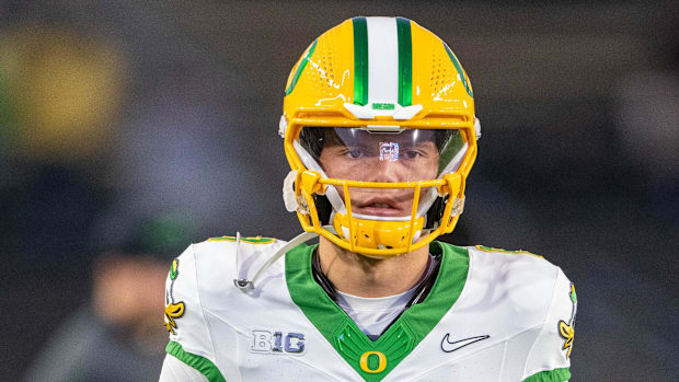 Oregon Ducks quarterback Dillon Gabriel (8) walks on the field before the game against the Purdue Boilermakers