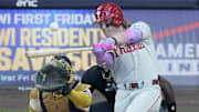 Sep 1, 2025; Milwaukee, Wisconsin, USA; Philadelphia Phillies outfielder Harrison Bader (2) hits a one run double during the sixth inning of their game against the Milwaukee Brewers Monday, September 1, 2025 at American Family Field in Milwaukee, Mandatory Credit: Mark Hoffman/USA TODAY Network via Imagn Images 