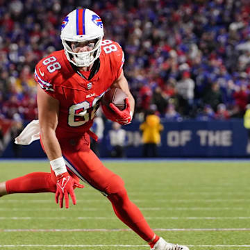 Oct 15, 2023; Orchard Park, New York, USA; Buffalo Bills tight end Dawson Knox (88) runs with the ball after making a catch against the New York Giants during the second half at Highmark Stadium. 