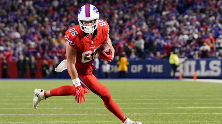 Oct 15, 2023; Orchard Park, New York, USA; Buffalo Bills tight end Dawson Knox (88) runs with the ball after making a catch against the New York Giants during the second half at Highmark Stadium. 