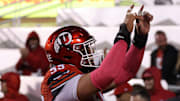 Oct 11, 2025; Salt Lake City, Utah, USA; Utah Utes offensive lineman Spencer Fano (55) celebrates a touchdown against the Arizona State Sun Devils during the third quarter at Rice-Eccles Stadium.  