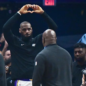 Nov 25, 2023; Cleveland, Ohio, USA; Los Angeles Lakers forward LeBron James (23) acknowledges the crowd during the first half of the game between the Cleveland Cavaliers and the Lakers at Rocket Mortgage FieldHouse. Mandatory Credit: Ken Blaze-Imagn Images