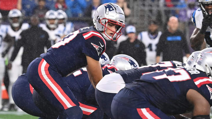 August 8, 2024; Foxborough, MA, USA;  New England Patriots quarterback Drake Maye (10) under center during the first half against the Carolina Panthers at Gillette Stadium. Mandatory Credit: Eric Canha-USA TODAY Sports