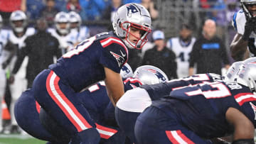 August 8, 2024; Foxborough, MA, USA;  New England Patriots quarterback Drake Maye (10) under center during the first half against the Carolina Panthers at Gillette Stadium. Mandatory Credit: Eric Canha-USA TODAY Sports