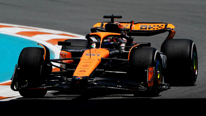 May 3, 2024; Miami Gardens, Florida, USA; McLaren driver Oscar Piastri (81) races into turn three during F1 practice at Miami International Autodrome. Mandatory Credit: John David Mercer-Imagn Images
