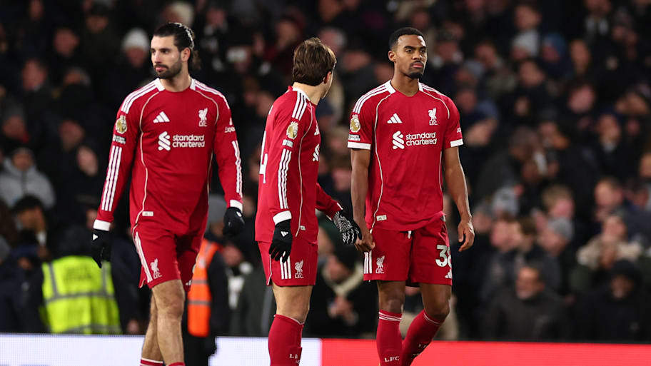 Liverpool players looking dejected.