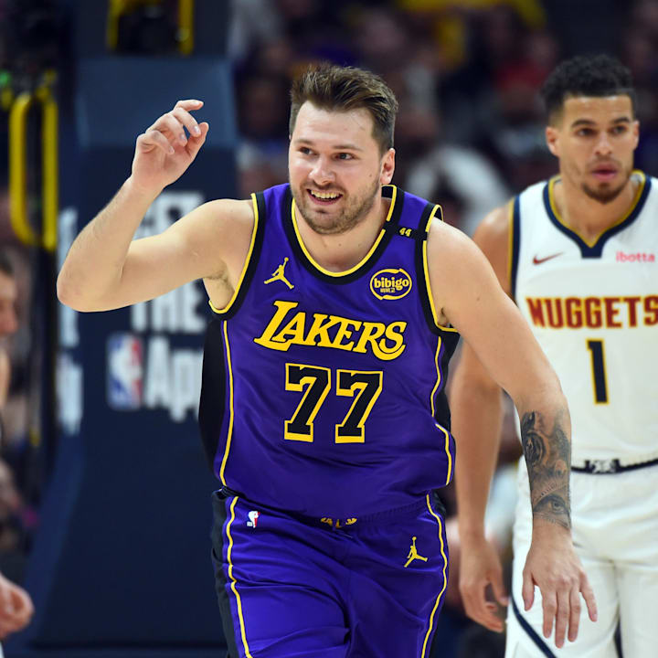 Los Angeles Lakers guard Luka Doncic celebrates after a basket during the first half against the Denver Nuggets at Ball Arena