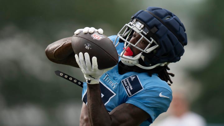 Tennessee Titans wide receiver Calvin Ridley (0) makes a long catch during training camp at Ascension Saint Thomas Sports Park Wednesday, Aug. 7, 2024.