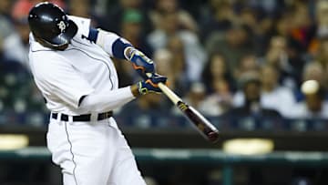 Detroit Tigers center fielder Rajai Davis (20) hits a single in the third inning against the Chicago White Sox at Comerica Park.