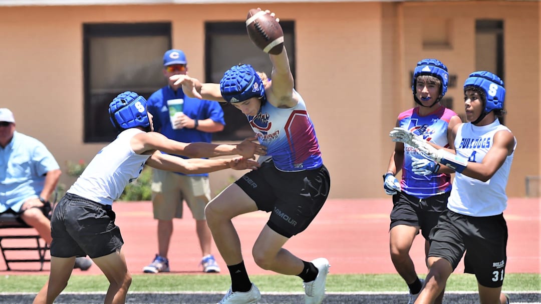 A Coleman player, near left, tries to avoid being tackled by a Stamford player after making an interception during a qualifying round game at the Abilene Division III 7-on-7 state qualifying tournament on Friday, June 10, 2022, at McMurry's Wilford Moore Stadium.

Diii 7on7 Sqt 019
