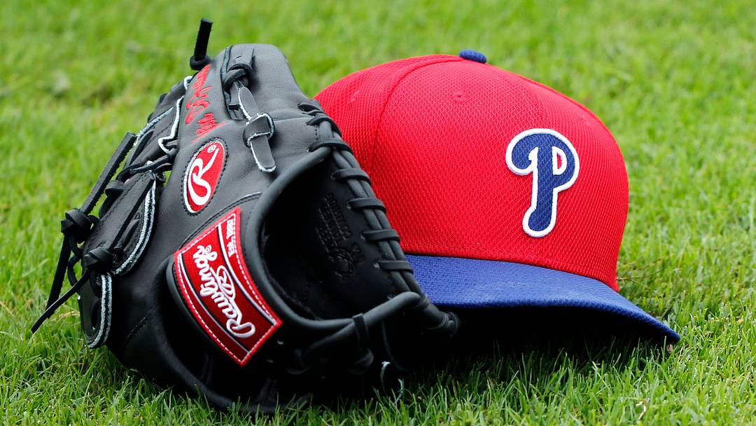 Feb 12, 2014; Clearwater, FL, USA; A general view of a Philadelphia Phillies hat and glove on the grass at Bright House Networks Field.